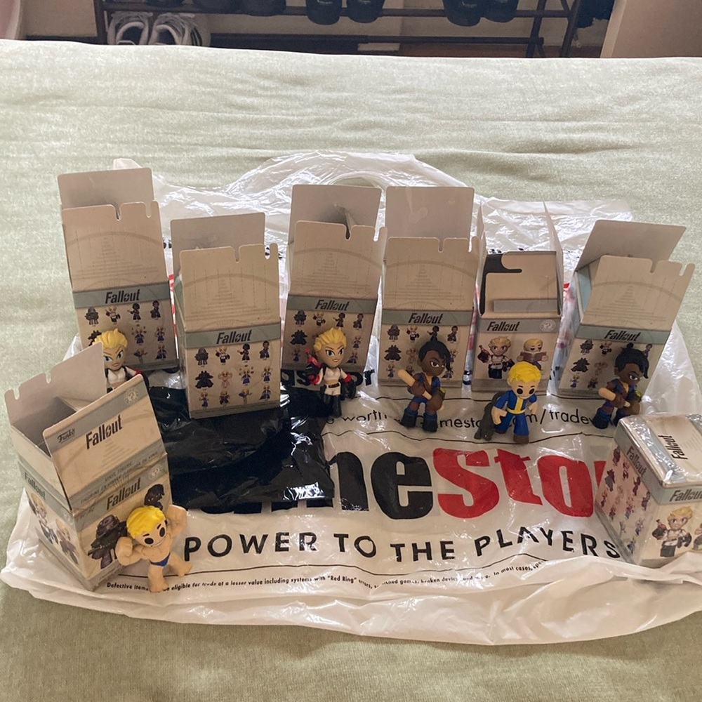 Fallout 8 figurines the two are unopened. Bought from GameStop.